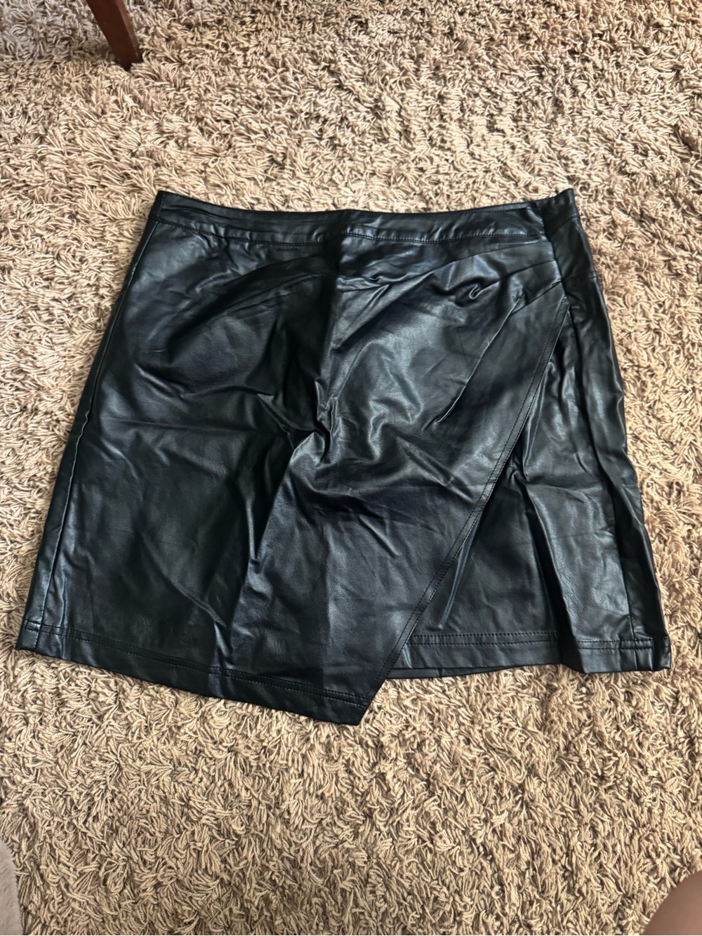 Black Faux Leather Asymmetrical Skirt by KORI